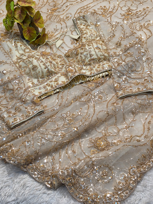Elegant Net Saree with Ready-Made Designer Blouse